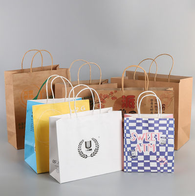 Umweltsmäßig druckten Brown-Gravürenkraftpapier-Papiertüten mit Logo 28* 22cm